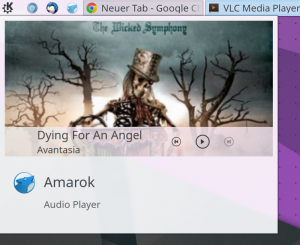 Controlling Amarok through a pinned launcher while its tray icon is buried deep in system tray